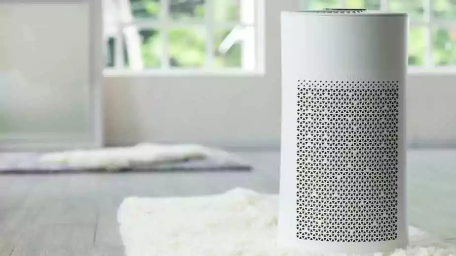 an air purifier kept in a room for quality breathing