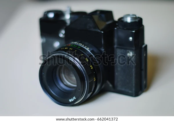 olympus camera in black and white frame