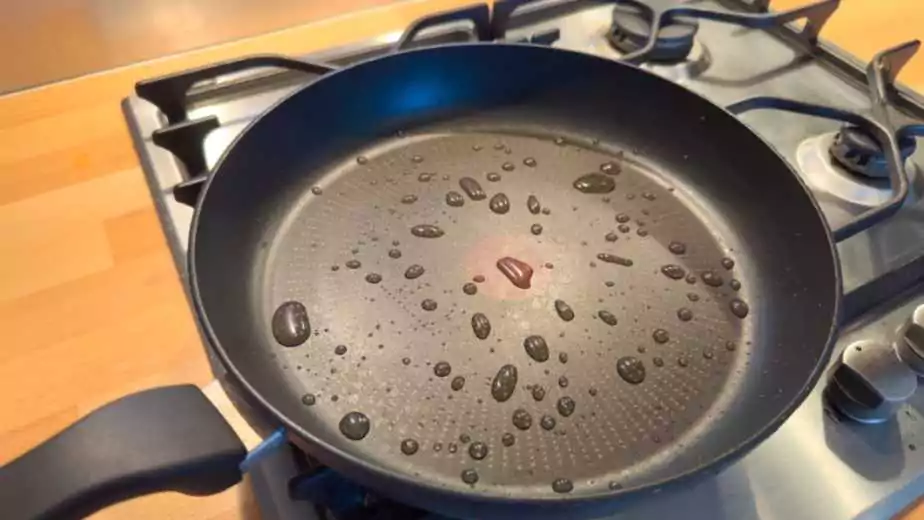 drops on teflon coated pan on stove