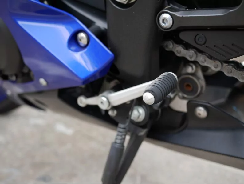 feet gear shift pedal in a modern motorcycle