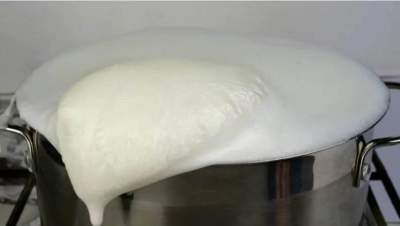 a fat layer of malai(cream) formed on boiling milk