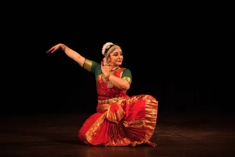 a girl performing bharatanatyam dance form