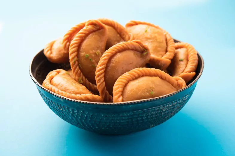gujia sweet dumplings made during the festival of holi and diwali