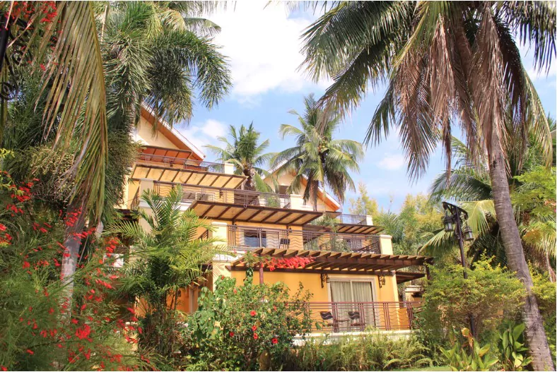 heritage villa with a tropical garden