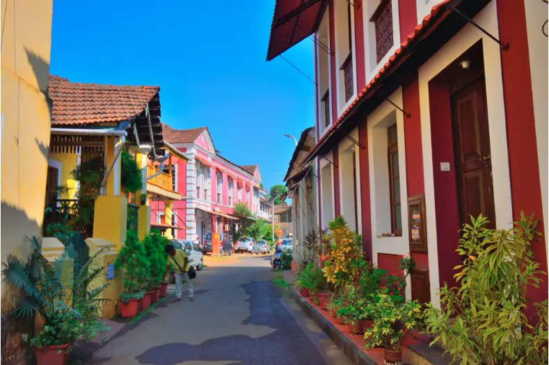 a narrow lane surrounded by colorful portuguese houses in panjim goa
