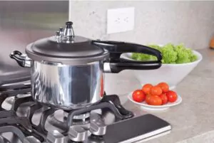 double valve pressure cooker in a kitchen