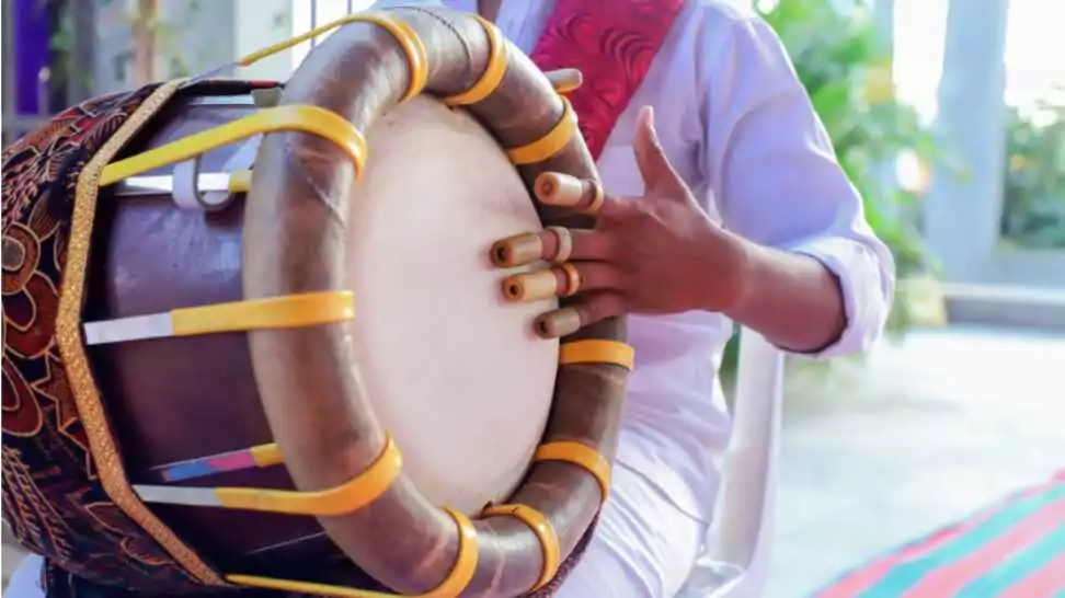 thavil a traditional barrel shaped musical instrument used in folk and carnatic music