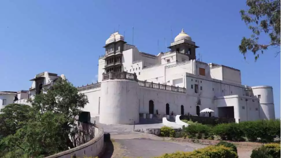 hilltop building in udaipur rajasthan named as sajjangarh palace
