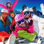 skiing winter snow sun and fun family enjoying winter vacations