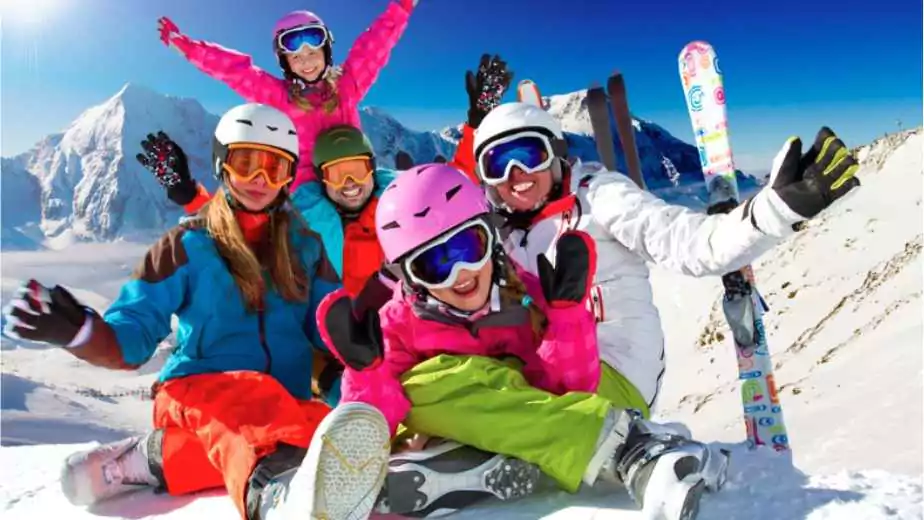 skiing winter snow sun and fun family enjoying winter vacations