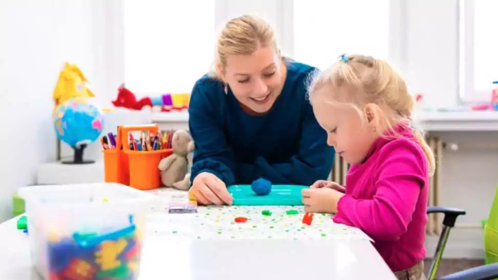 toddler girl in child occupational therapy session