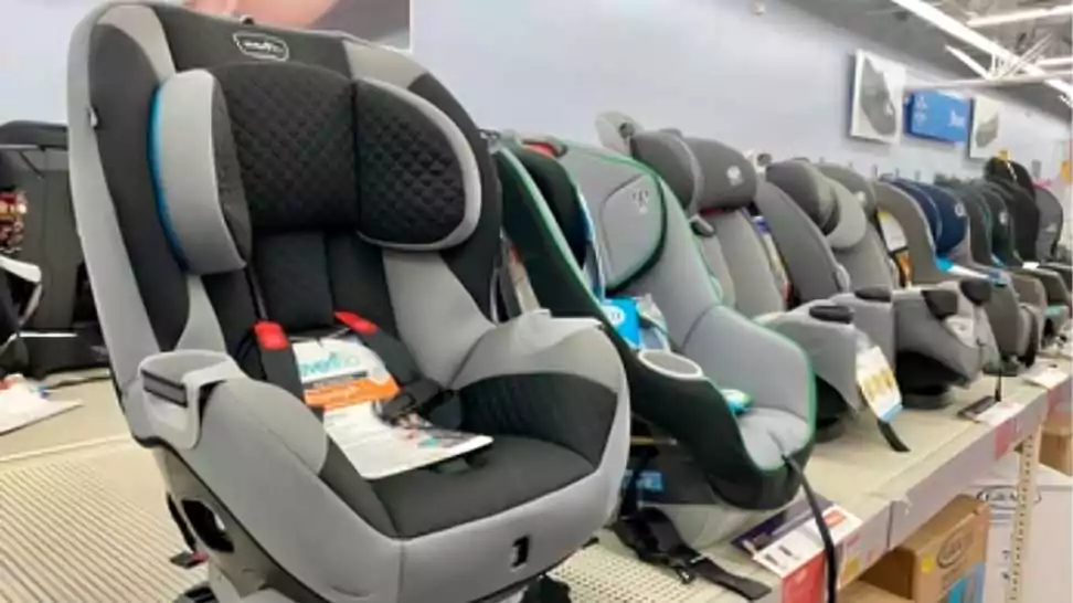 branded child car seats on display at a super center walmart store