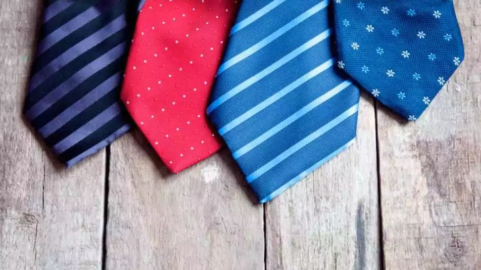 an assortment of different colorful neckties each with a different style and pattern