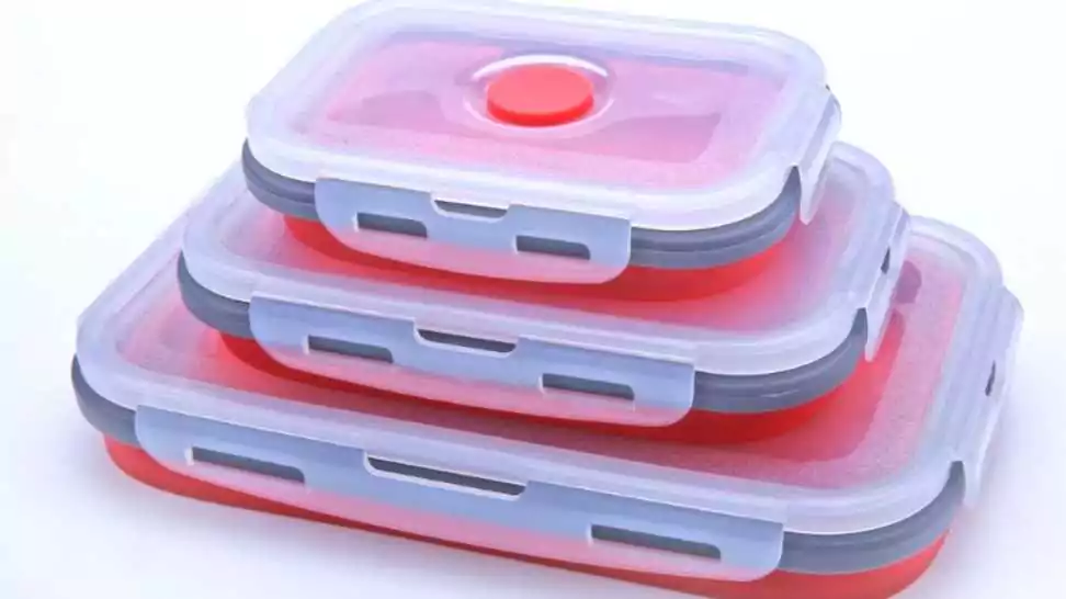 red silicone lunch box on white background
