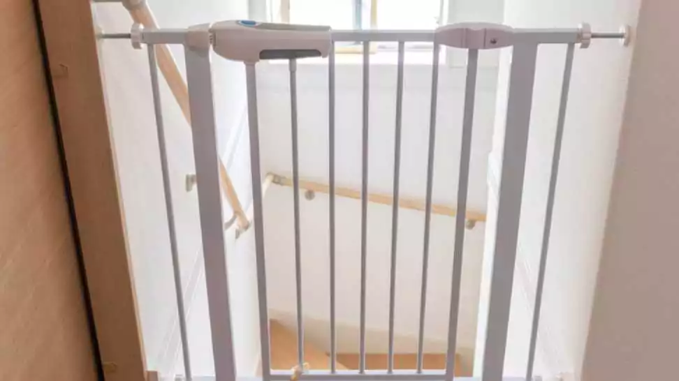baby gate installed on the stairs